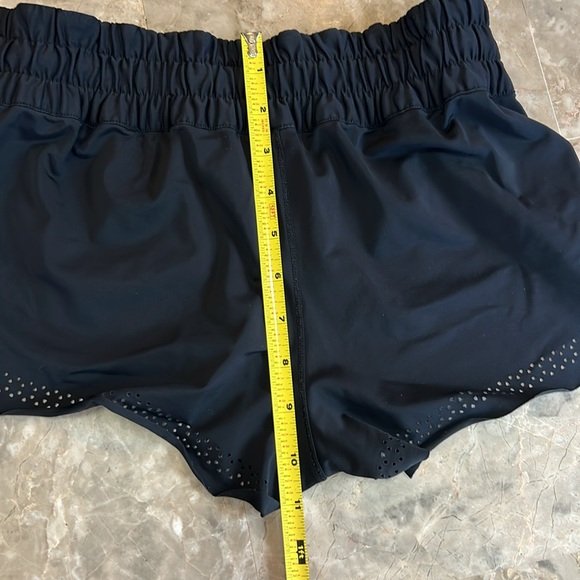 Lululemon black unlined shorts with decorative holes. Rare find! Super cute! - Picture 7 of 7
